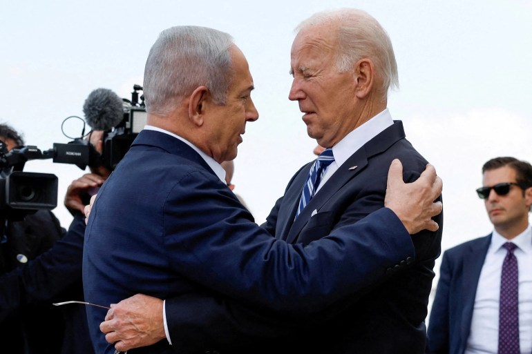 FILE PHOTO: U.S. President Joe Biden is welcomed by Israeli Prime Minster Benjamin Netanyahu, as he visits Israel amid the ongoing conflict between Israel and Hamas, in Tel Aviv, Israel, October 18, 2023. REUTERS/Evelyn Hockstein//File Photo