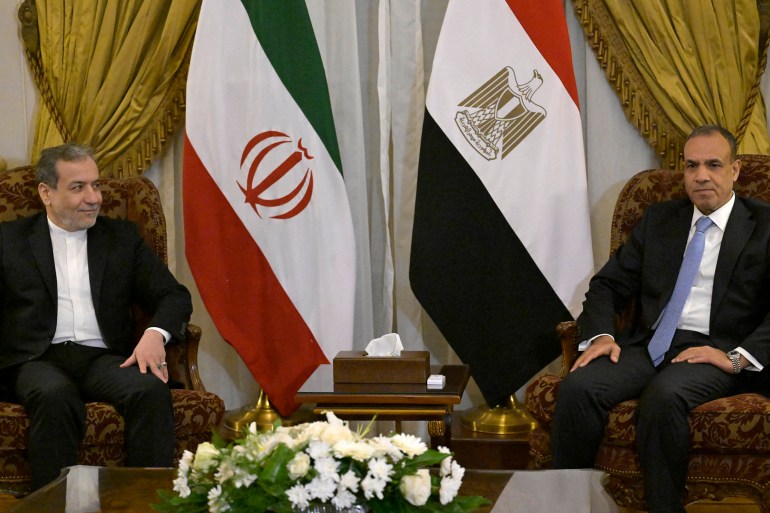 Egypt's Foreign Minister Badr Abdelatty (R) meets with his counterpart from Iran Abbas Araghchi in Cairo on October 17, 2024. (Photo by Khaled DESOUKI / AFP)