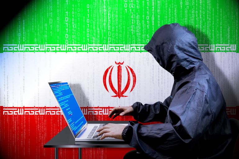 Anonymous hooded hacker, flag of Iran, binary code - cyber attack concept