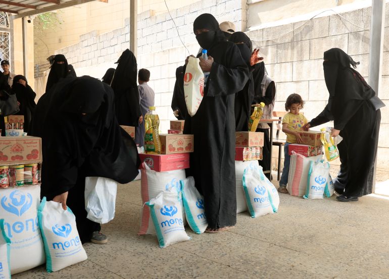 epa12275268 Yemenis receive rations of food aid, supplied by the Mona Relief agency, in Sana'a, Yemen, 31 July 2025. Yemen’s food security situation is projected to worsen between September 2025 and February 2026 with an estimated 18.1 million people, 52 percent of the war-ravaged Arab country’s population, expected to face high levels of acute food insecurity due to severe economic decline, conflict and severe reductions in humanitarian aid, according to a recent report by the Integrated Food Security Phase Classification (IPC). EPA/YAHYA ARHAB