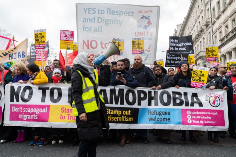 London, UK. 16th Feb, 2019. A Muslim woman protester shouts 'No To Islamophobia' during Anti-Racism demonstration in London.